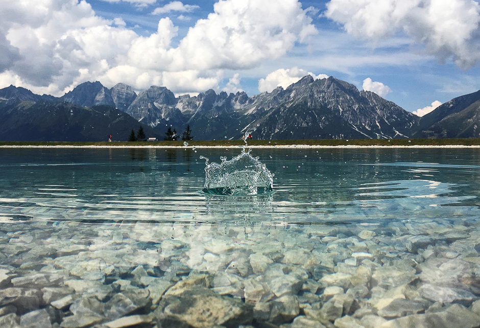 A stone falls into a small lake at Serles mountain on a sunny autumn day in the western Austrian village of Mieders, Austria. PHOTO: REUTERS