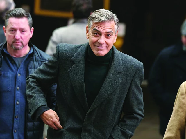 clooney also co wrote the show photo file clooney also co wrote the show photo file