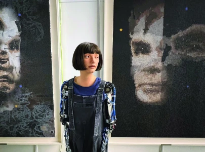 first robot artist ai da to auction painting