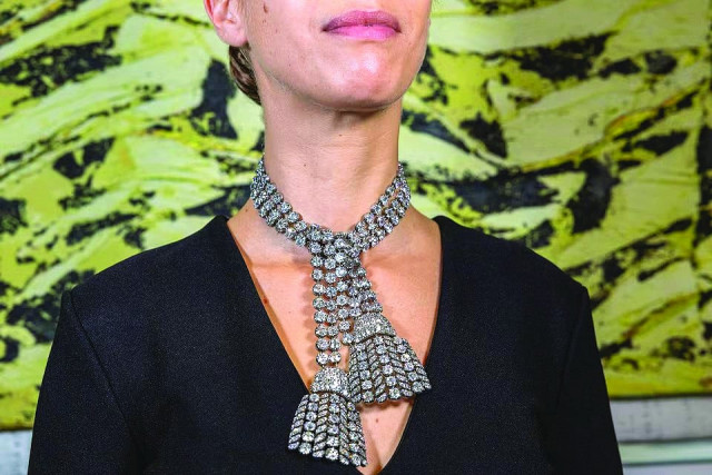 the scarf like necklace can be worn open or knotted photo reuters the scarf like necklace can be worn open or knotted photo reuters