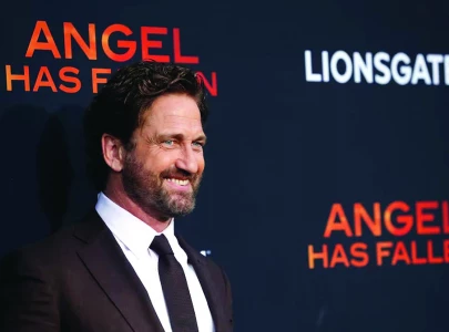 gerard butler plays singing santa in latest film gerard butler plays singing santa in latest film