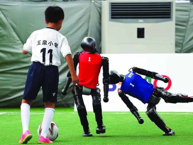 t1 humanoid robot falls on football pitch photo reuters t1 humanoid robot falls on football pitch photo reuters