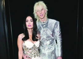 mgk shares rare photo of baby daughter saga blade to mark album anniversary