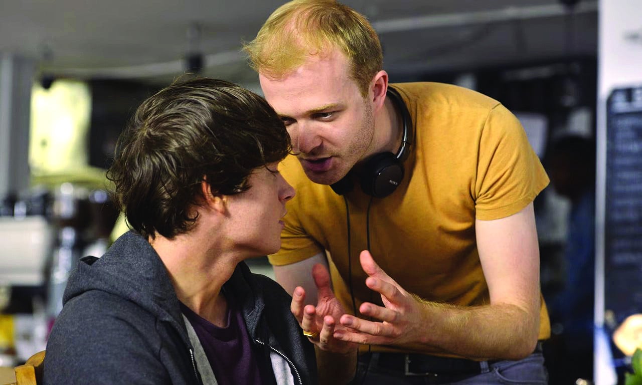 morse talks a scene with lead actor in lucid photo guardian