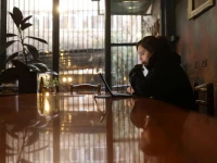 an iranian woman samaneh tries to connect to the internet to check on her visa status for her migration process after a nationwide internet shutdown since january 8 2026 photo reuters