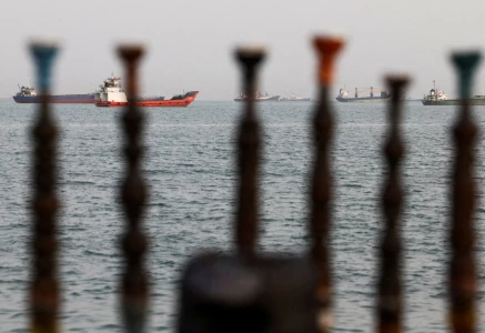 vessels in the strait of hormuz are visible near the beach of bandar abbas iran on may 22 2026 photo reuters