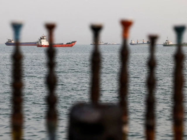 vessels in the strait of hormuz are visible near the beach of bandar abbas iran on may 22 2026 photo reuters vessels in the strait of hormuz are visible near the beach of bandar abbas iran on may 22 2026 photo reuters