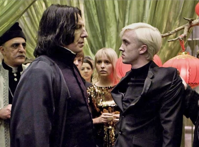 alan rickman was terrifying in the most pleasant way tom felton remembers late actor