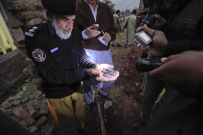 bomb targets security official in peshawar no casualties bomb targets security official in peshawar no casualties