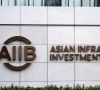 aiib eyes road power projects