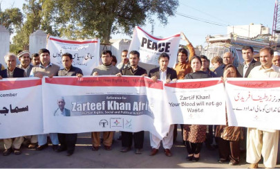 rights activists vow to carry slain colleague s torch