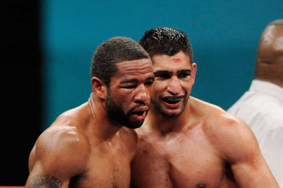 boxing peterson edges khan to claim world titles boxing peterson edges khan to claim world titles