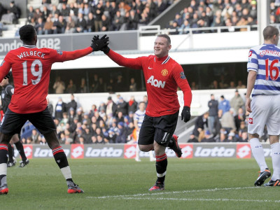 premier league rooney carrick star in one sided victory