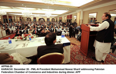 sharif tries to woo businessmen with promise of tax cut