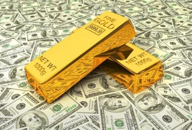 strong dollar rising yields push gold lower