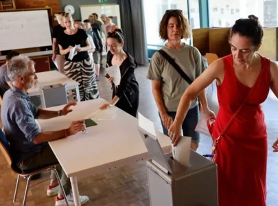 swiss reject divisive anti immigration proposal