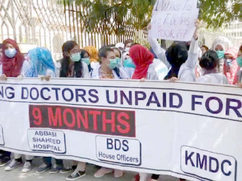 doctors staged a demonstration outside the kmc building on tuesday they demanded payment of their salaries and stipends due for the past nine months photo ppi