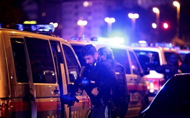 police blocks a street near schwedenplatz square after exchanges of gunfire in vienna austria november 2 2020 photo reuters