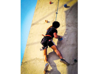 adventure sports thrills and fun as climbers soar towards the sky