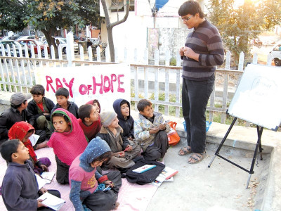 free classes in a football ground in f 8 two brothers give scavengers a ray of hope free classes in a football ground in f 8 two brothers give scavengers a ray of hope