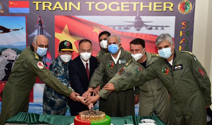 Air Chief Marshal Mujahid Anwar Khan. Chief of the Air Staff Pakistan Air Force. and H.E. Mr. Nong Rong, Chinese Ambassador to Pakistan along with high ranking officers from both air forces cutting cake at the culmination of Pak-China International Air Exercise Shaheen-IX. (24-12-2020). PHOTO: PAF