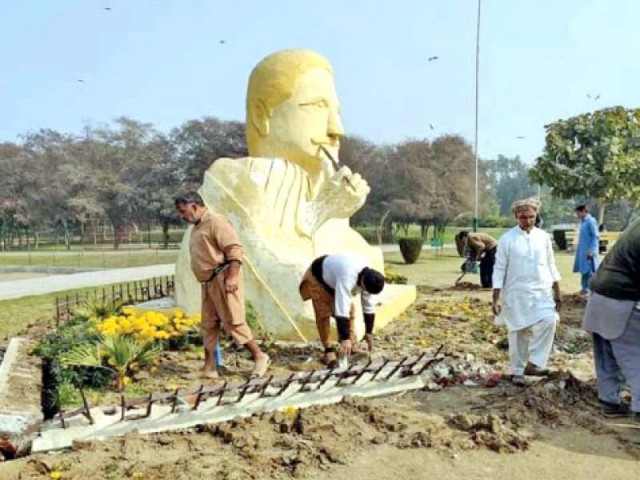 pha workers remove the sculpture of allama iqbal from a park in lahore photo ppi pha workers remove the sculpture of allama iqbal from a park in lahore photo ppi
