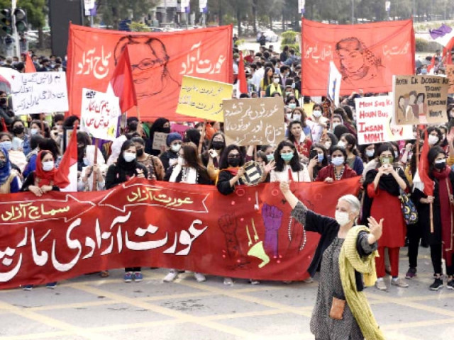 holding banners and placards participants at the aurat azadi march shout slogans in the federal capital photos online holding banners and placards participants at the aurat azadi march shout slogans in the federal capital photos online