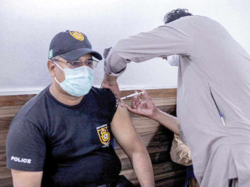 a police official receives an anti covid jab at the vaccination centre inaugurated at ssu on monday photo nni