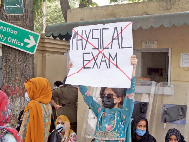 a student holds a placard during a protest outside the rawalpindi press club photo online