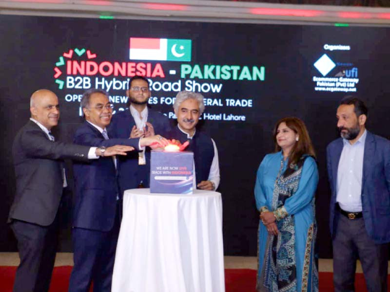 punjab minister for industries and trade mian aslam iqbal and ambassador of indonesia to pakistan adam tugio inaugurate the b2b online portal photo express