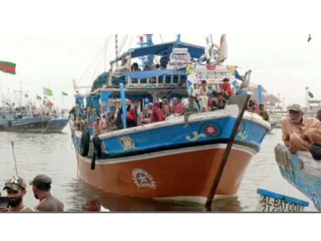 fishermen and their families block the karachi port s channel with their boats during a protest in favour of their rights on august 7 2021 photo express fishermen and their families block the karachi port s channel with their boats during a protest in favour of their rights on august 7 2021 photo express