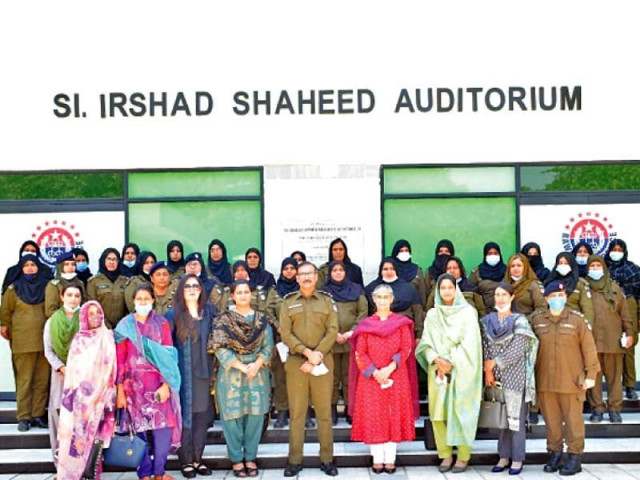 the participants of the workshop line up for a photograph after the conclusion of the session photo express the participants of the workshop line up for a photograph after the conclusion of the session photo express