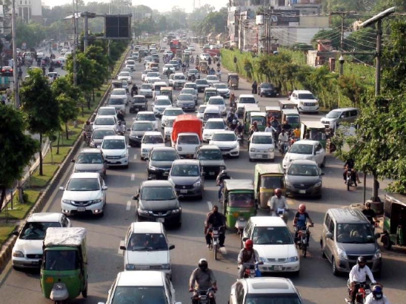 motorists on jail road try to get past the traffic jam on thursday traffic flow was badly affected due to diversions and heightened security photo zahoor ahmed express