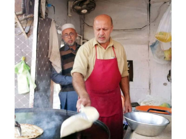 ishaq khan afridi cooks parathas for his customers at his shop in westridge rawalpindi photo express ishaq khan afridi cooks parathas for his customers at his shop in westridge rawalpindi photo express