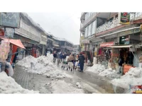 businesses reopened after the main roads of murree were cleared of snow photo express