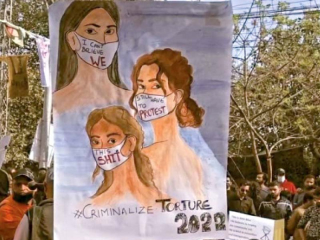 citizens hold placards and chant slogans while attending the aurat march on tuesday march 8 2022 photo express citizens hold placards and chant slogans while attending the aurat march on tuesday march 8 2022 photo express