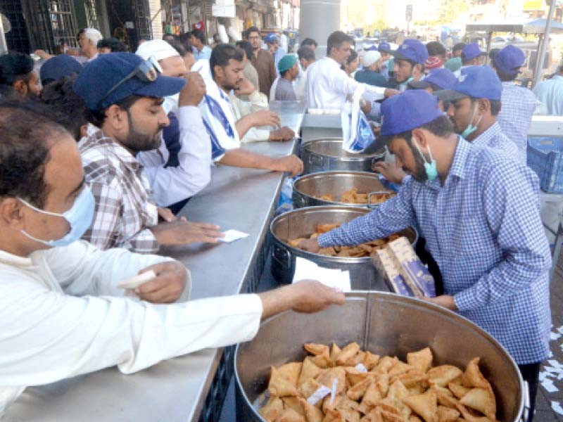 citizens purchase fried items in preparation for breaking their fast health practitioners advise against excessive consumption of oily and sugary foods in ramazan photo express