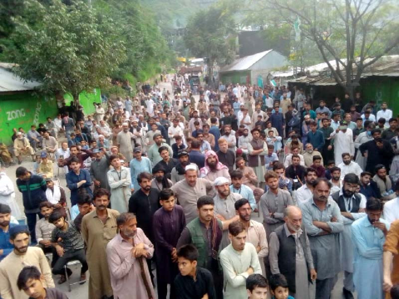 balakot dam victims stage a sit in and block the kaghan highway causing inconvenience to commuters photo express