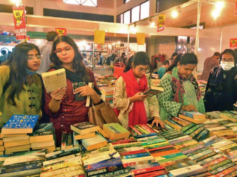 women browse through books available on discount at karachi book fair under way at expo centre photo jalal qureshi express