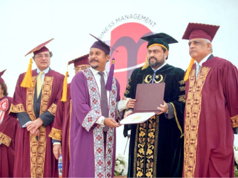 sindh governor kamran tessori awards a degree to a graduating student during the 25th convocation of the iobm photo express