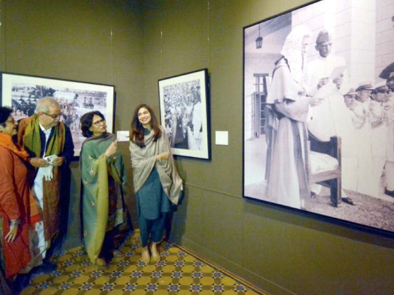 people watch historical images of quaid i azam on display at mohatta palace museum photo jalal qureshi express