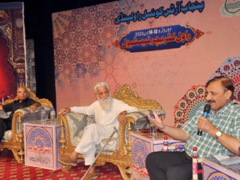 dr inamul haq javed addresses the participants of a session at the 2023 rawal literature festival photo express