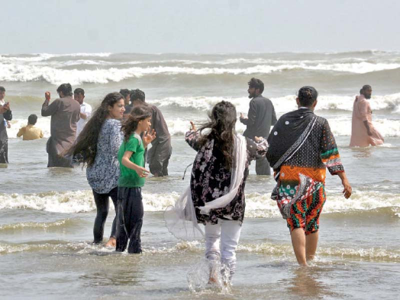 people enjoy at the seaview beach on the third day of eidul azha photo jalal qureshi