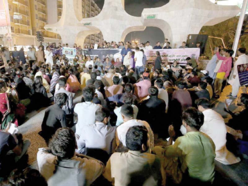 people hold sit in protest at the teen talwar intersection against kidnaping of hindu community members in kashmore photo nni