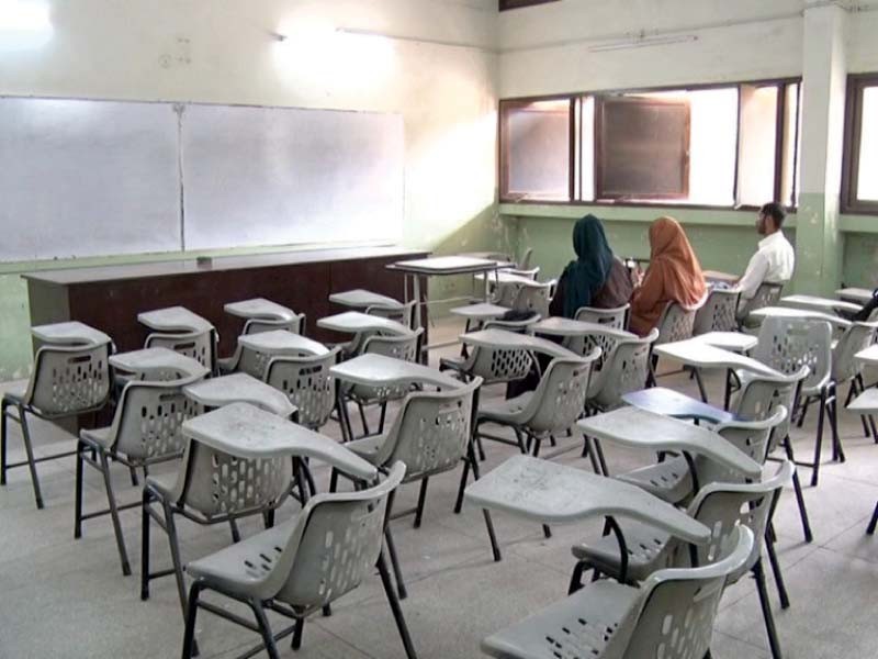 students sit idle in a classroom at the university of karachi due to the teachers boycott of classes photo express
