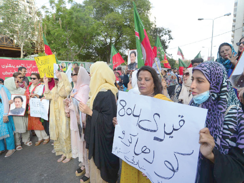 pakistan tehreek e insaf supporters stage a protest outside the karachi press club to demand the release of party founder imran khan photo jalal qureshi express