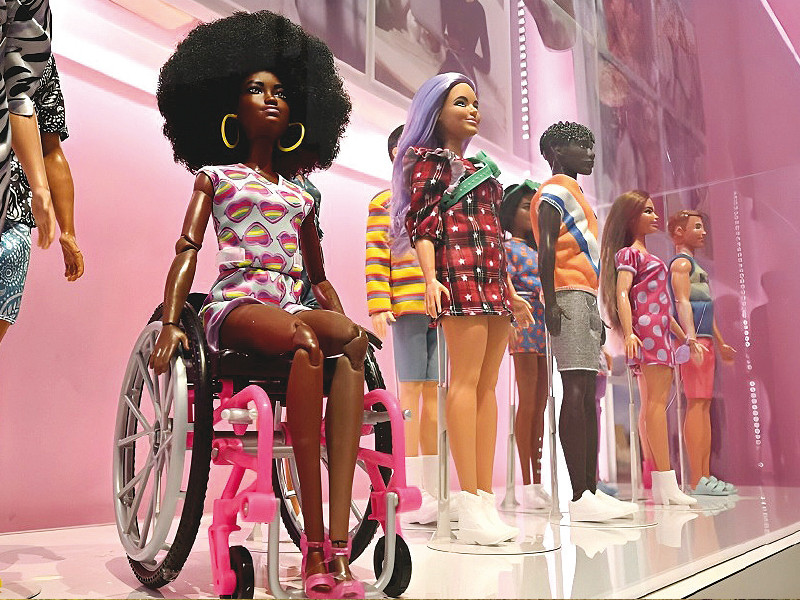 other firsts include a black barbie and one in a wheelchair photo file