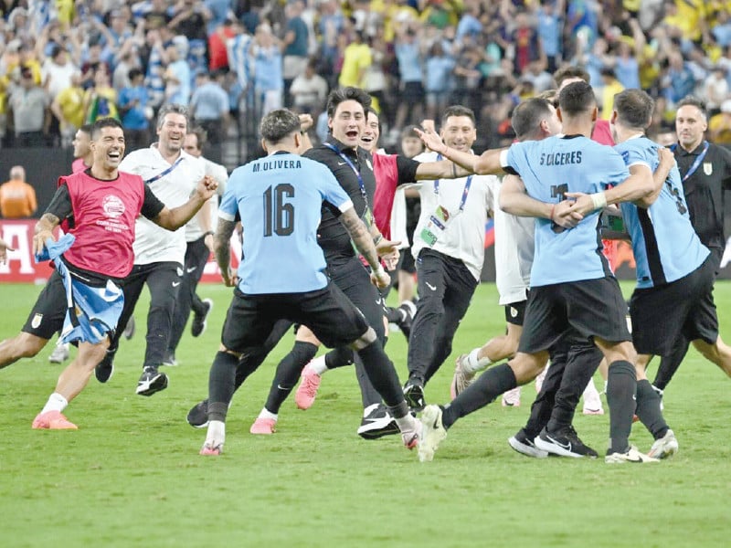 uruguay celebrate a penalty shoot out victory over brazil in their copa america quarter final on saturday photo afp