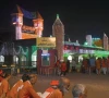 porters wait for passengers outside the lahore railway station colourfully illuminated on the eve of the independence day photo express mehmood qureshi