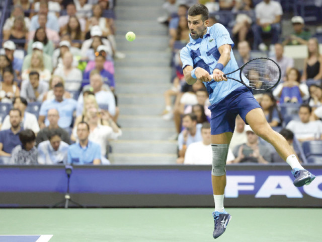 defending champion novak djokovic in action during the us open first round photo afp
